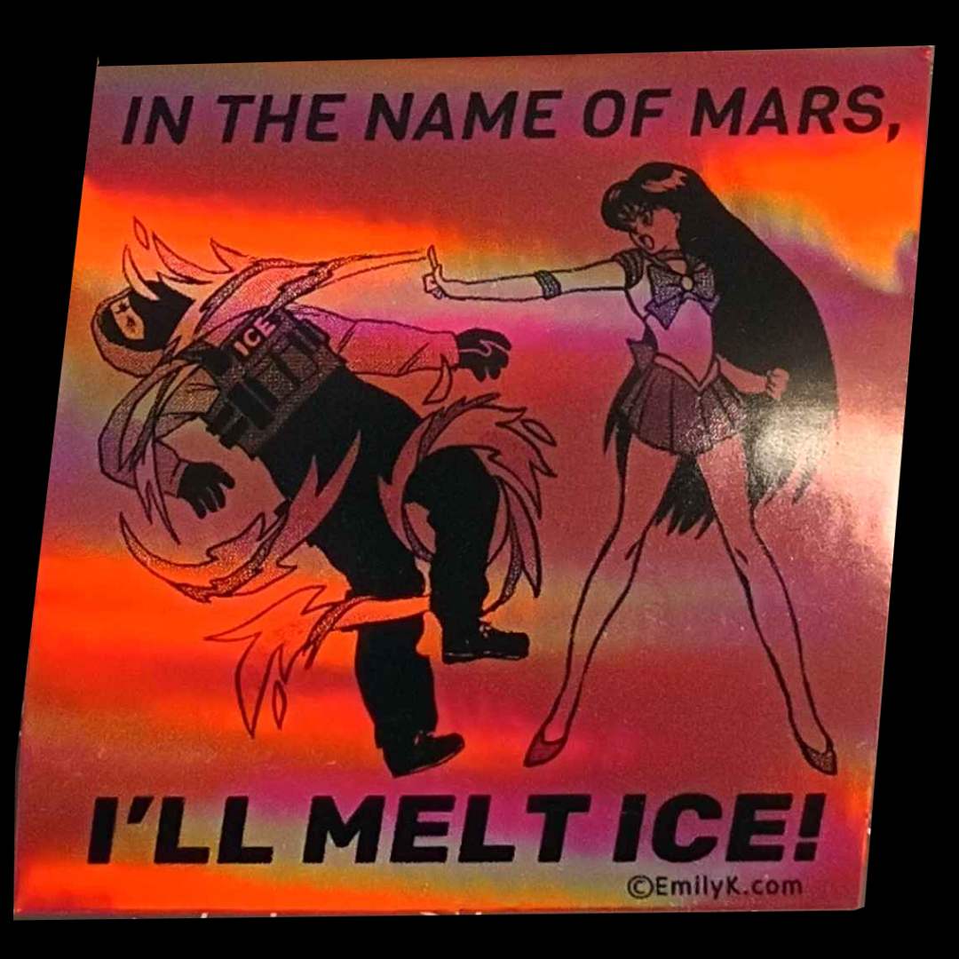 a red rectangular sticker with a holographic rainbow shiny sheen.